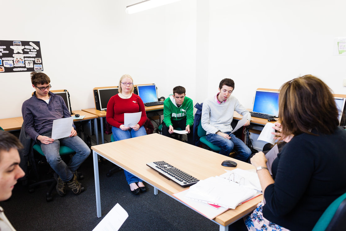 Additional support for learning.  lecturer with students %282%29 gallery