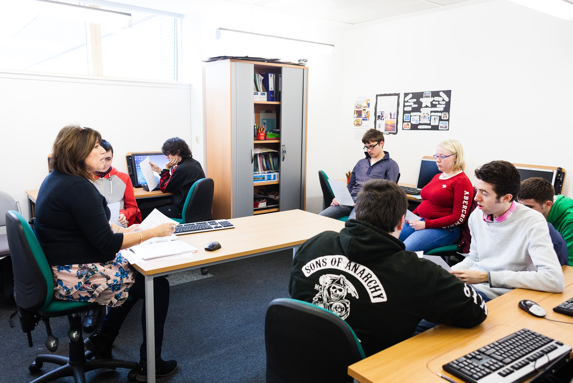 Additional support for learning.  lecturer with students gallery