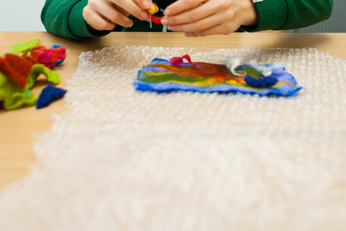 Additional support for learning. student working with coloured clays %282%29 gallery