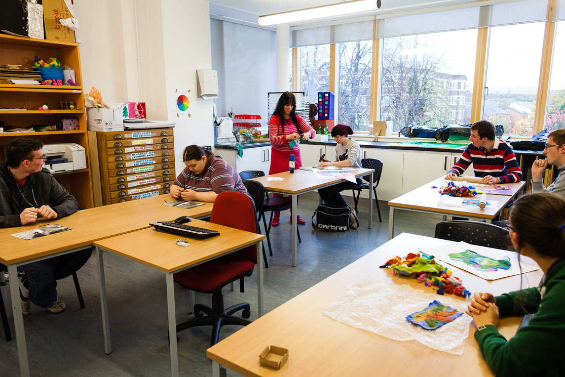 Additional support for learning. wider shot of classroom with students and lecturer gallery