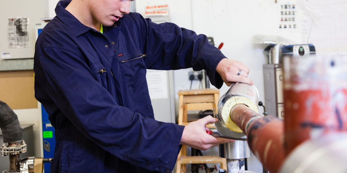 Engineering Student Creating Pipe