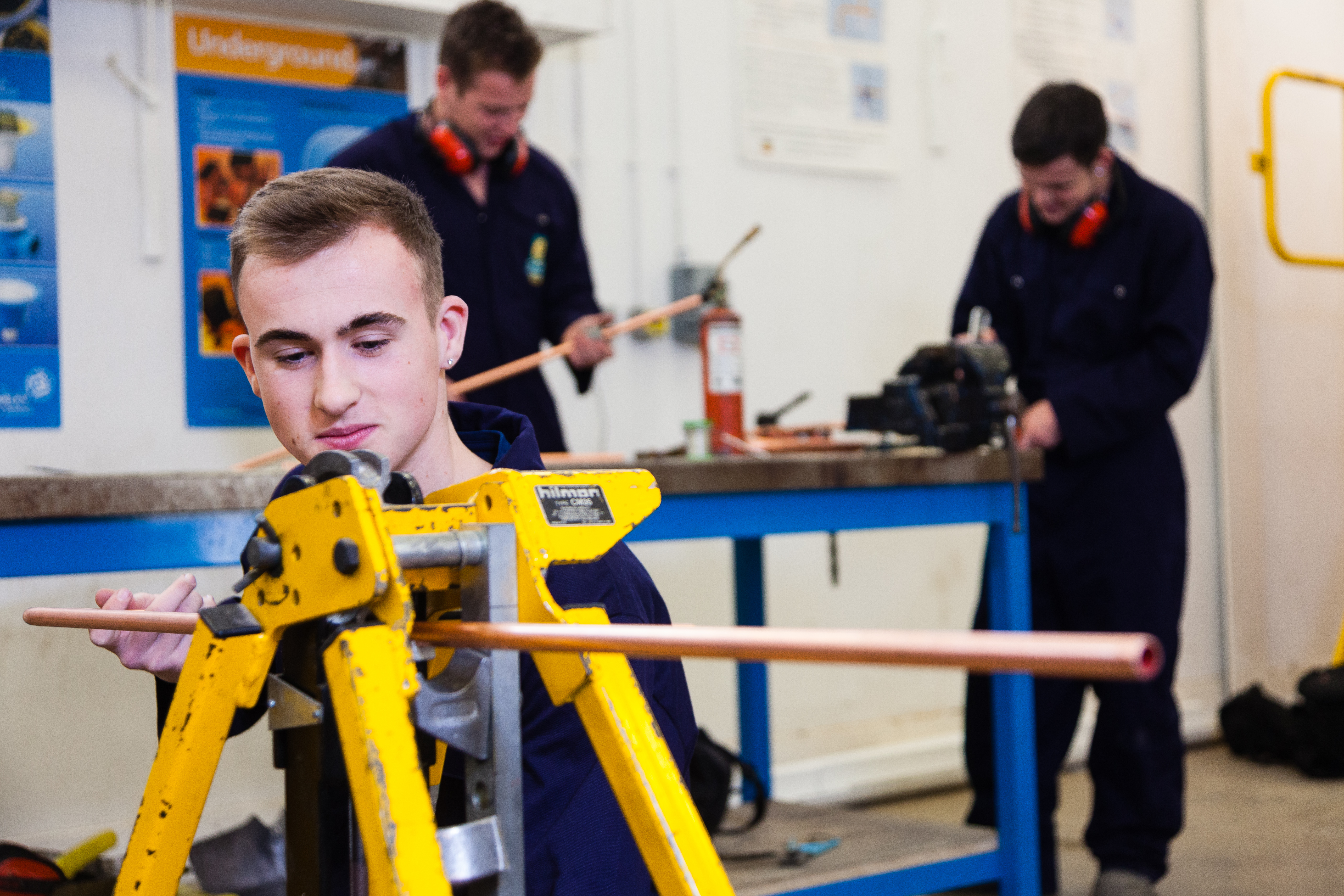 Plumbing Student Working With Copper Pipe