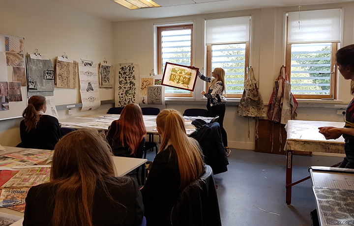 School Pupils Learning About Fashion And Textiles