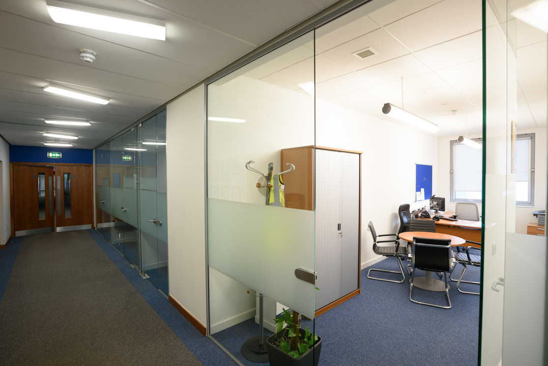 Langside office through glass wall gallery
