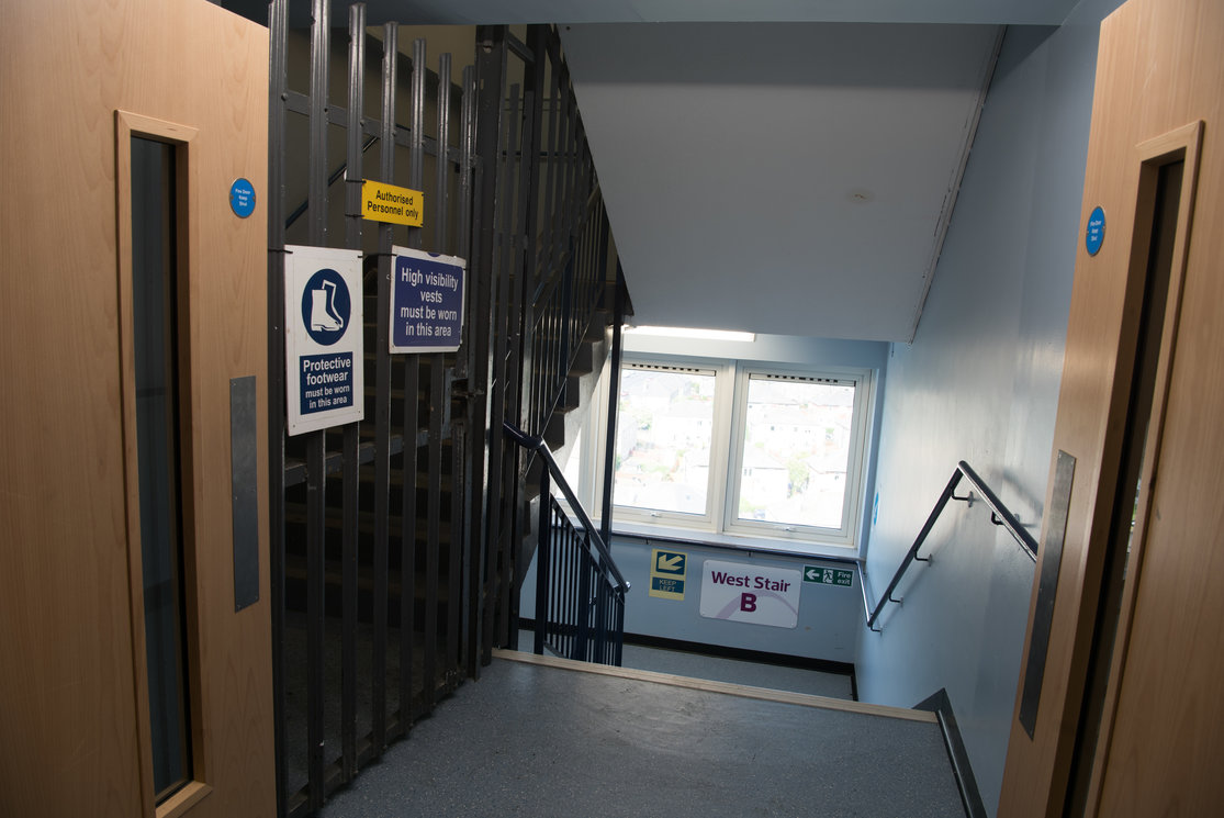 Cardonald stairwell with metal gates gallery