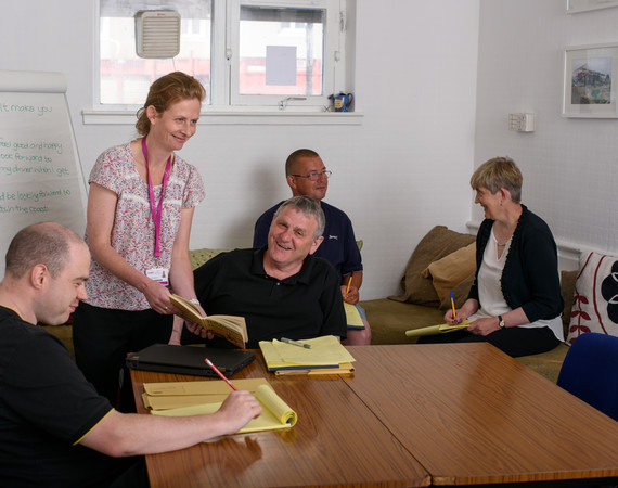 community class with tutor in classroom