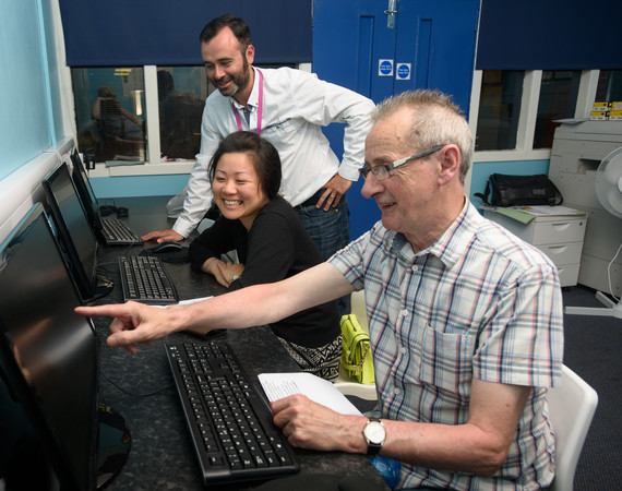 community class man pointing at PC