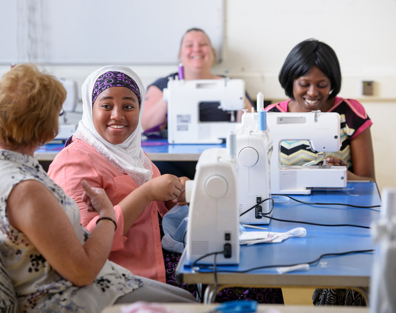 community group enjoying a sewing class