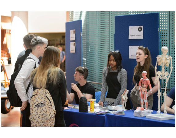 School pupils at an information stand