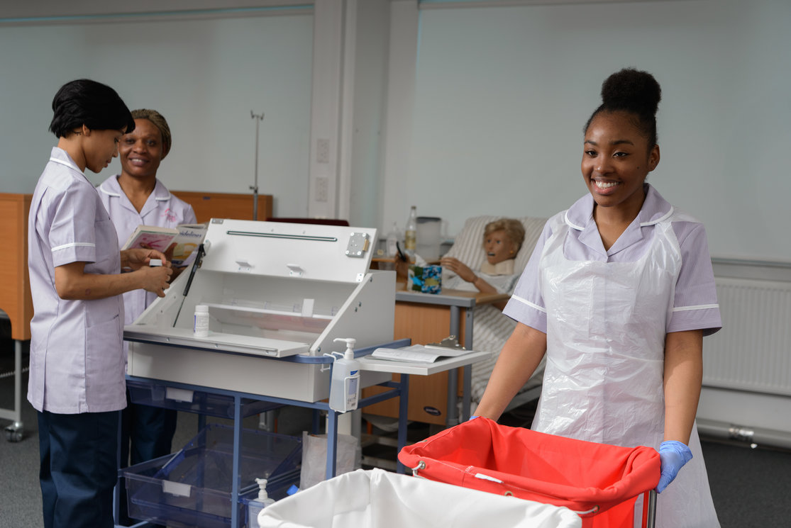 Esol transitions to health care   female student pushing trolley  image 5 gallery