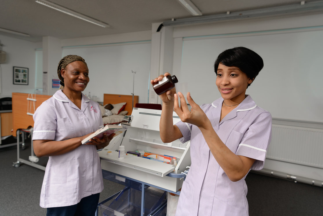 Esol transitions to health care   female students sorting medicine  image 5 gallery