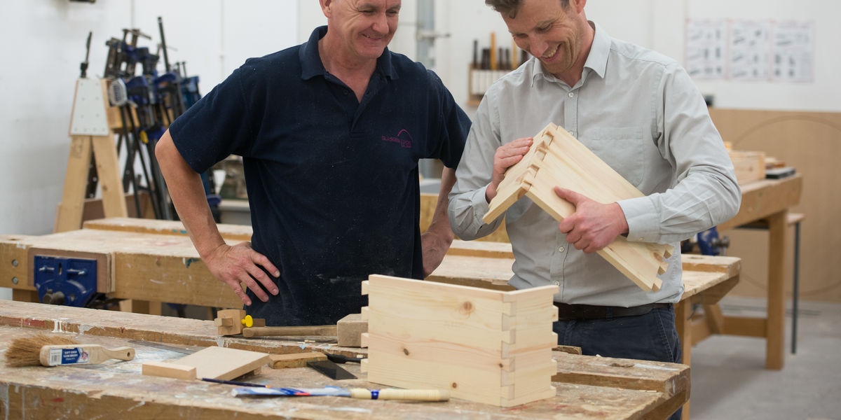 Woodcraft student and lecturer talking