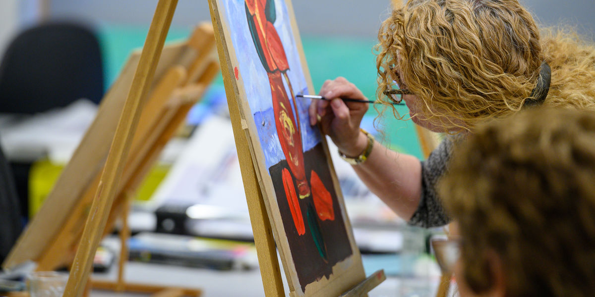 Drawing and painting student at work