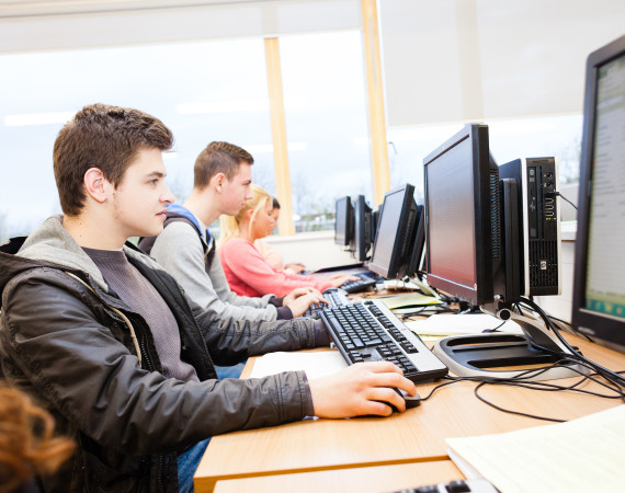 Business students working at computers