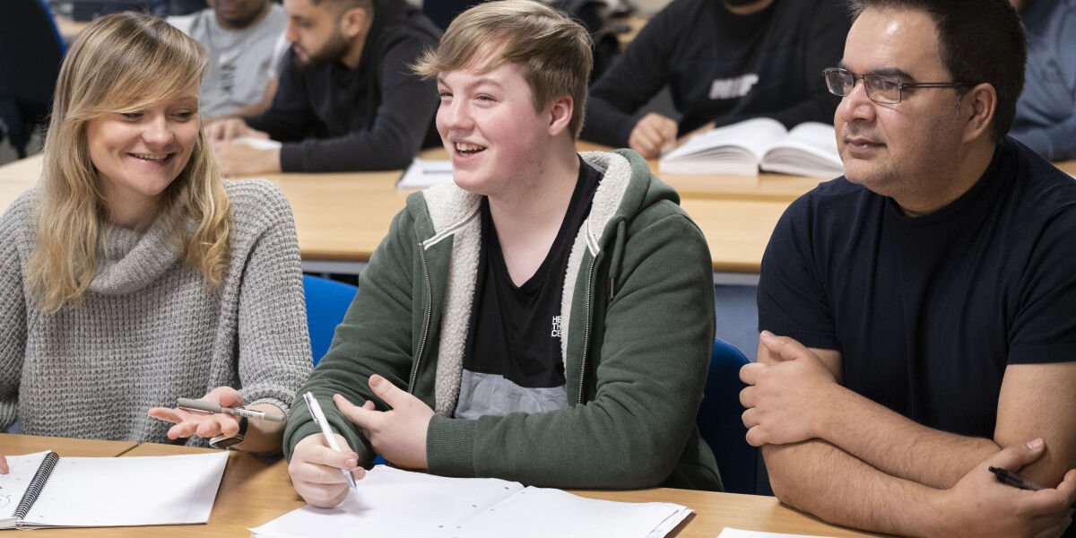Glasgow Clyde College HND Business students sitting in class.