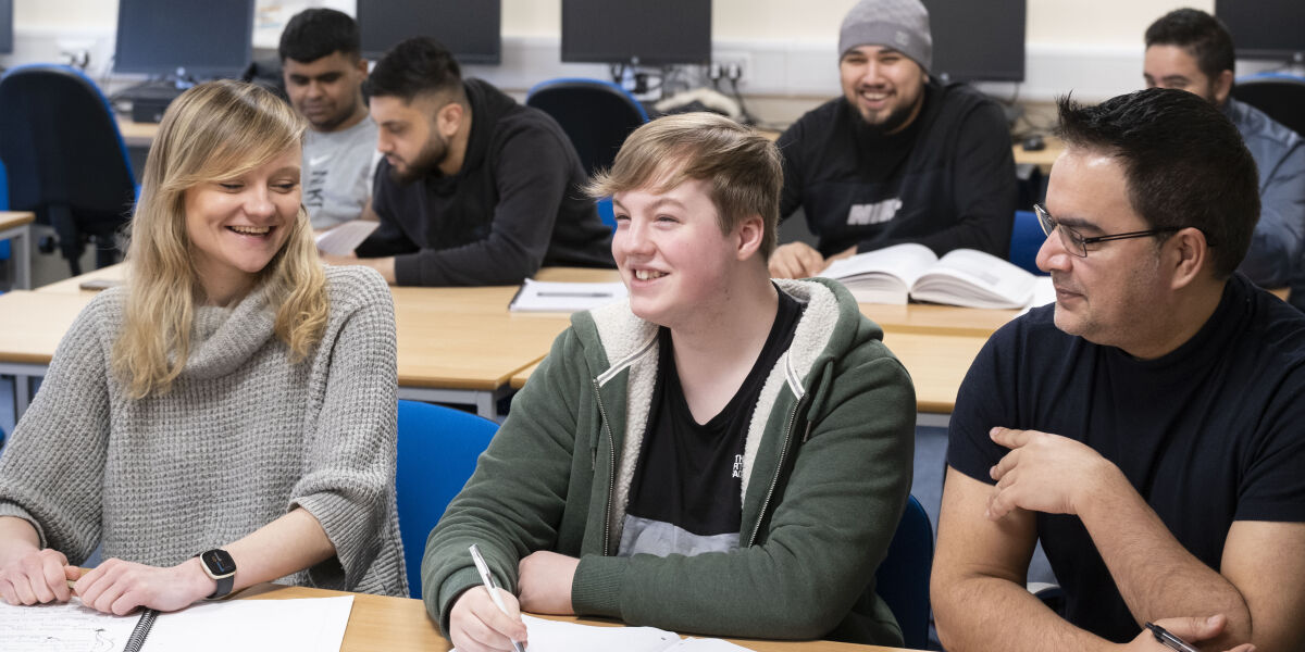 Glasgow Clyde College HND Business students sitting in class.