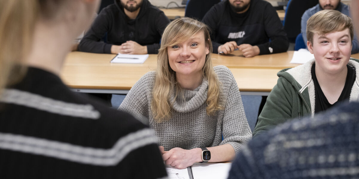 Glasgow Clyde College HND Business students sitting in class.