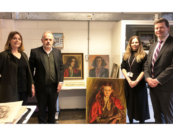 Image shows examples of artwork bequeathed with, from left to right, Colin Read and Amanda Dovesi from Drummond Read, Michelle Kaye, Collections Lead at the Glasgow School of Art Archives and Collections and Jon Vincent, Principal of Glasgow Clyde College. 