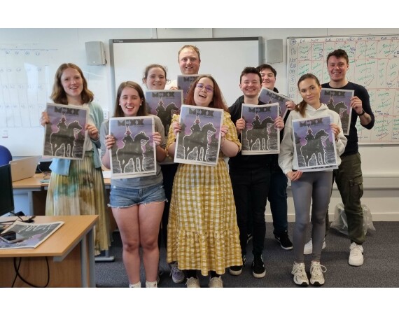 Lecturer Rosie Gibson with journalism students each holding copies of Mixx magazine