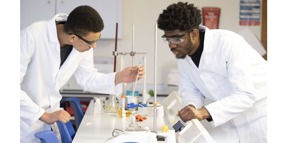 Two male science students in science lab