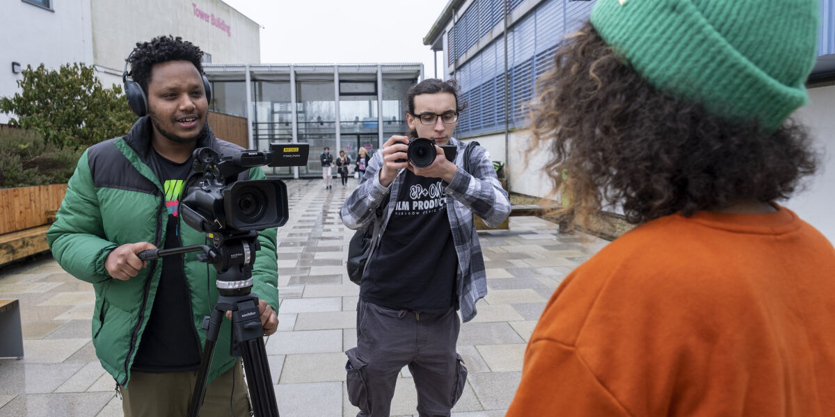 Media students filming on campus