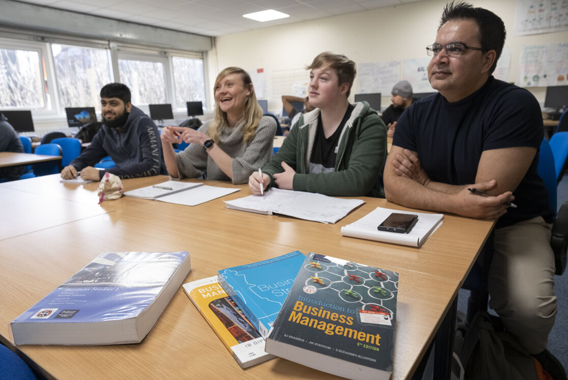 Students in class listening to lecturer gallery