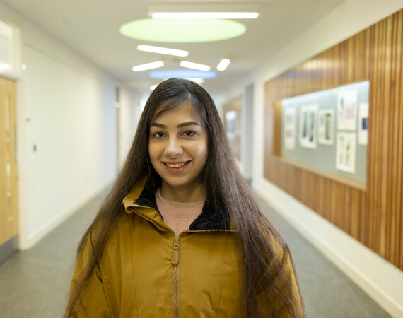 female student in the hallway