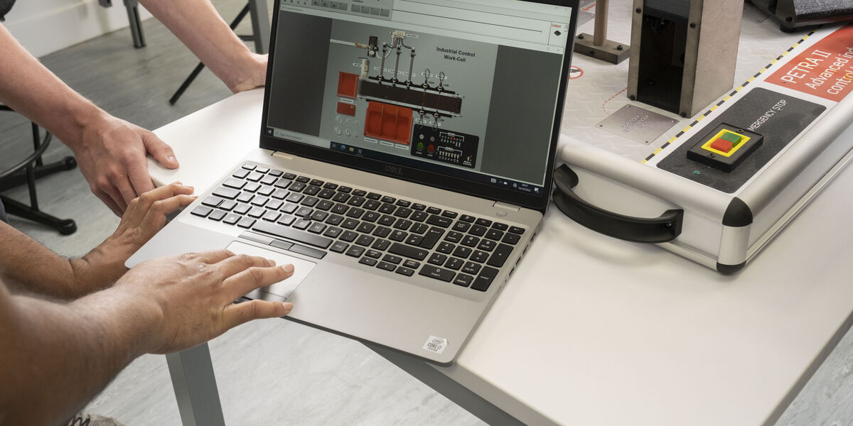 students working on laptop