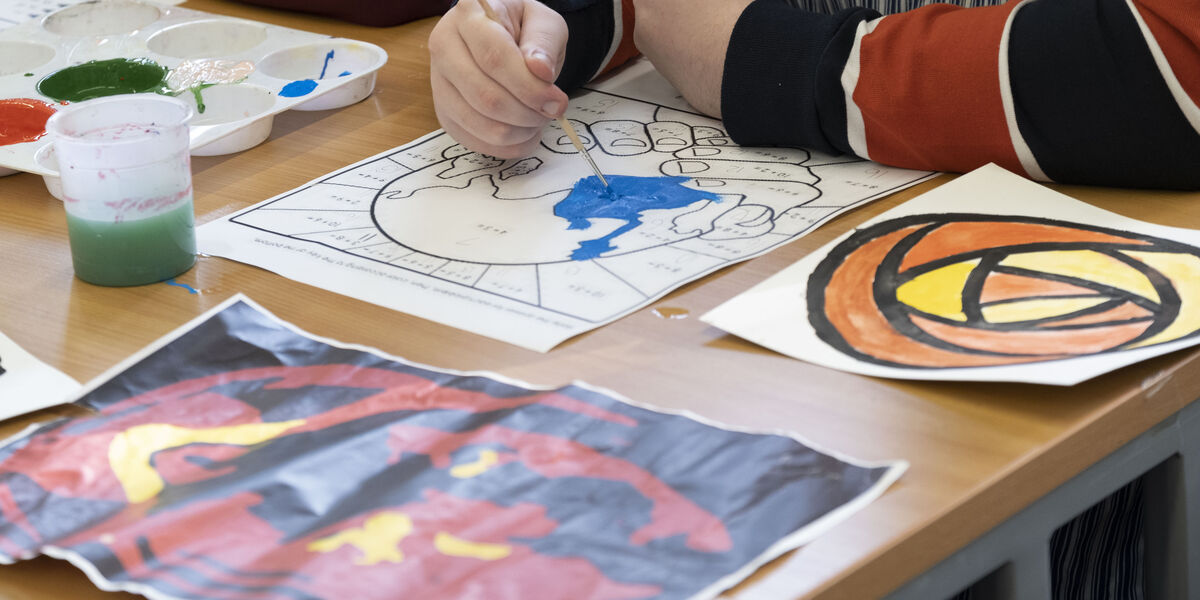 A student undertaking an art project. 