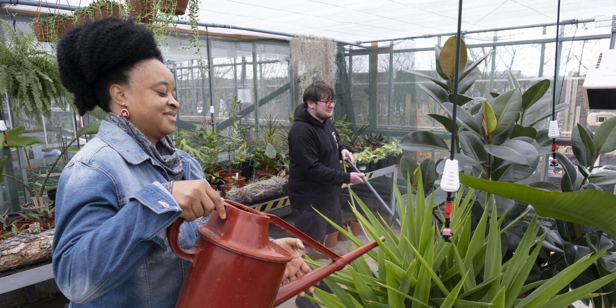 Horticulture students working in the glasshouse