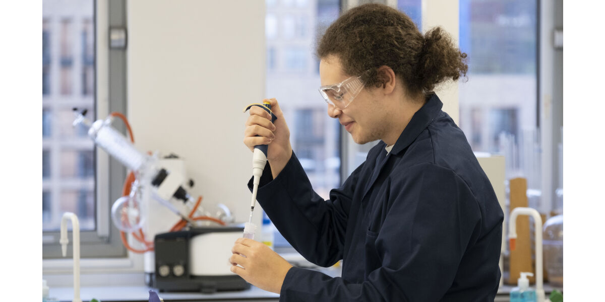 Student undertaking an experiment. 