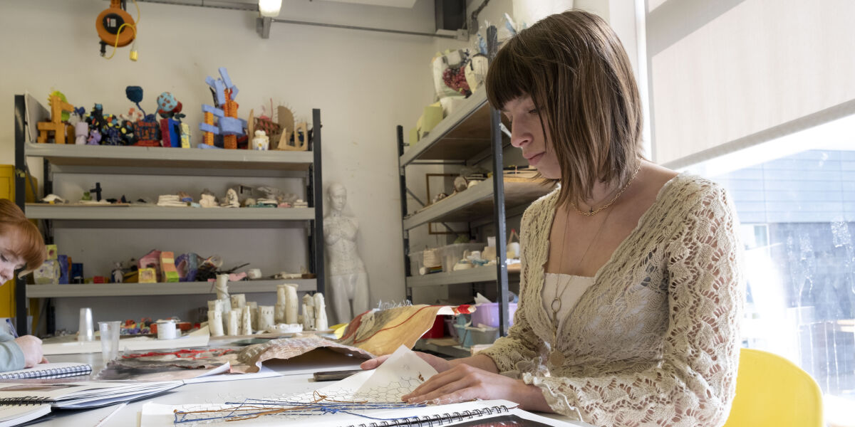 Glasgow Clyde College Art student working on sketches