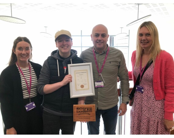 Scots Language Winner Thomas Atkins with staff