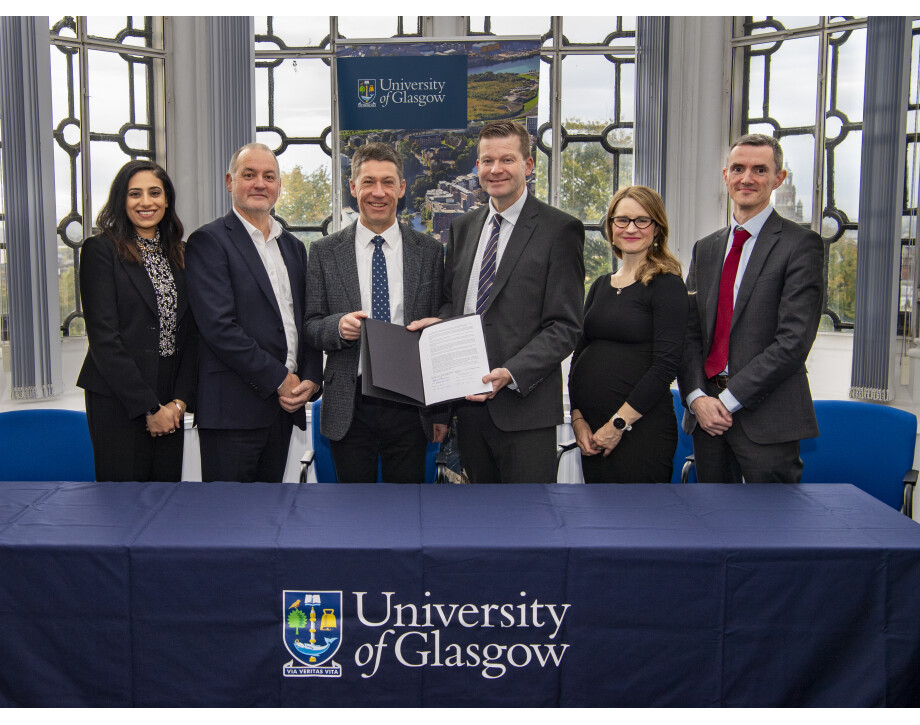 Jon Vincent signing MOU with University of Glasgow