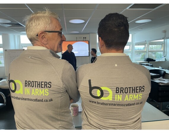 Image of two representatives from Brothers in Arms