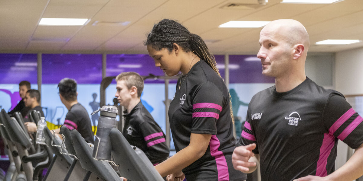 Health and Fitness Students on the treadmills in the gym.
