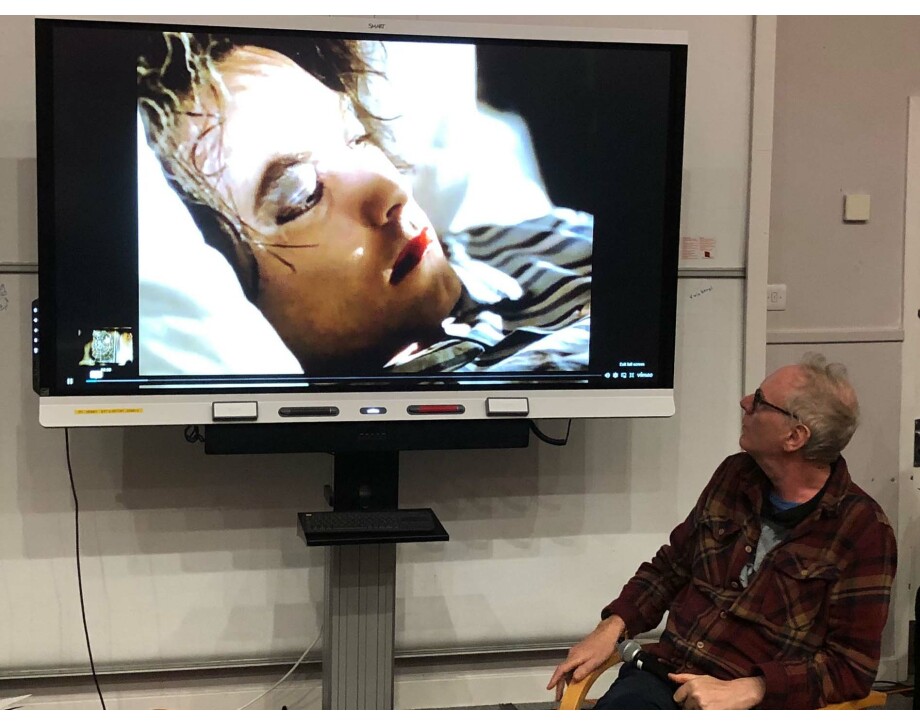 Image of Tim Pope featuring a still of Robert Smith from the music video for The Cure single Lullaby.