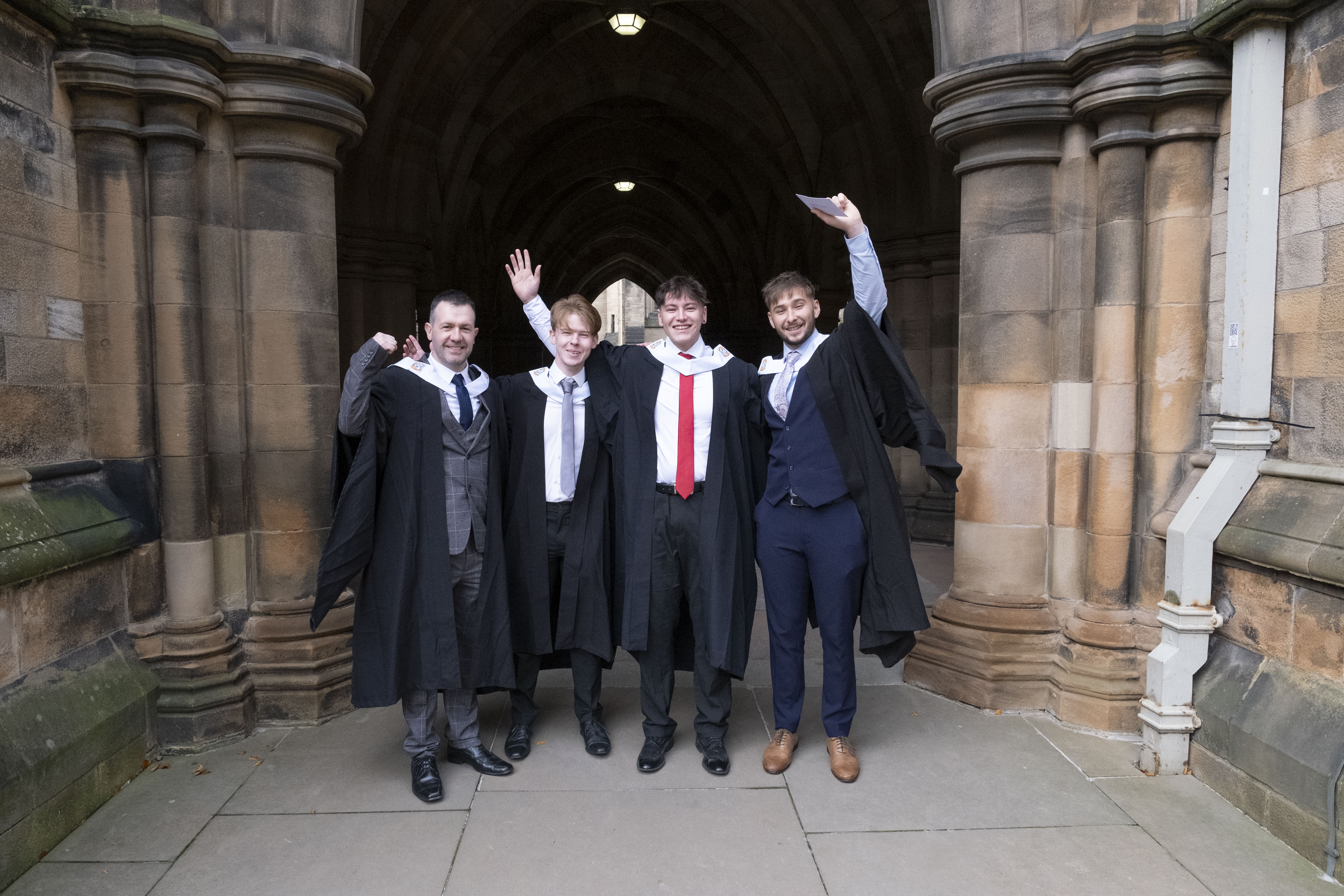 Four male graduates at Graduation 2023