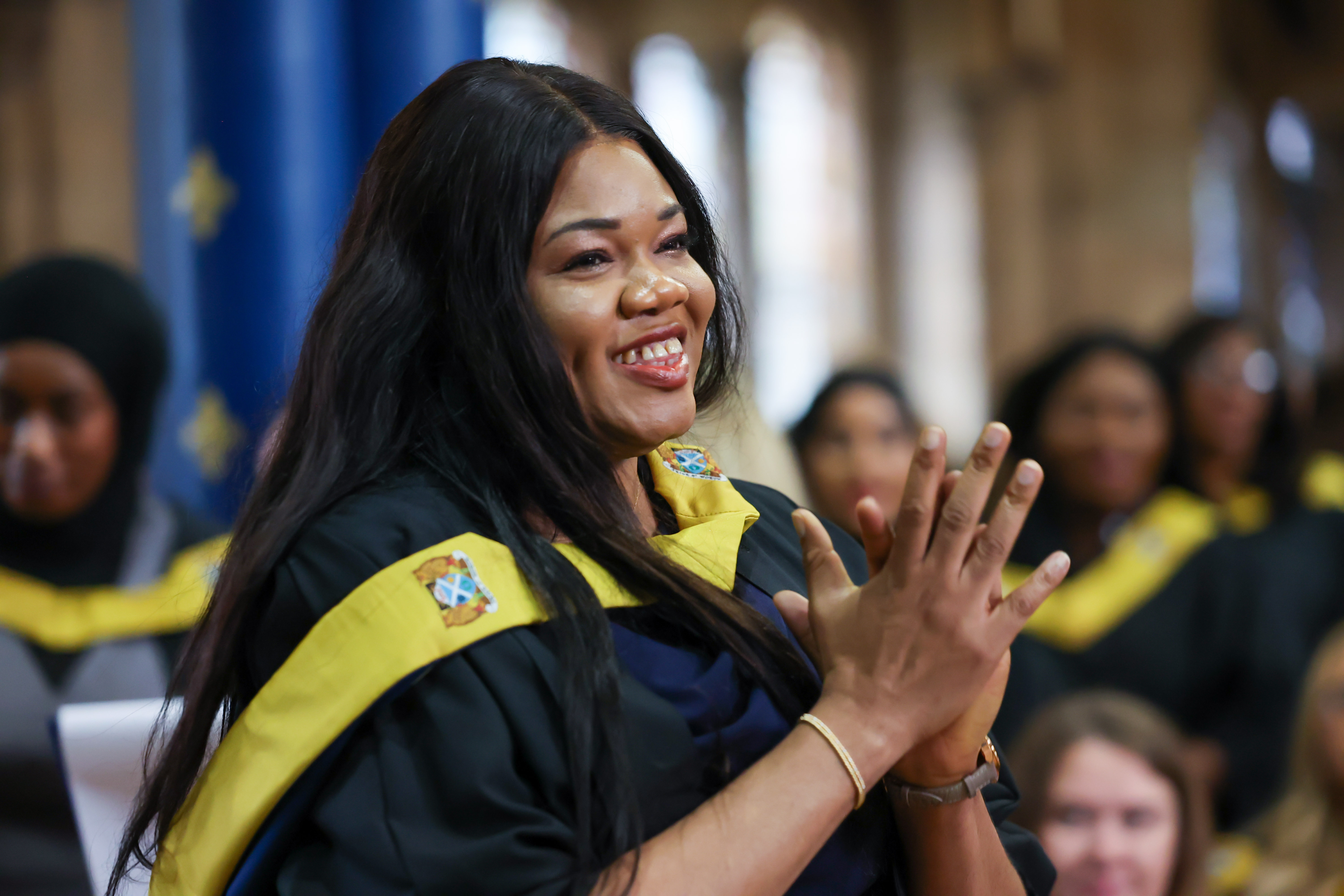 Graduation image showing smiling female student