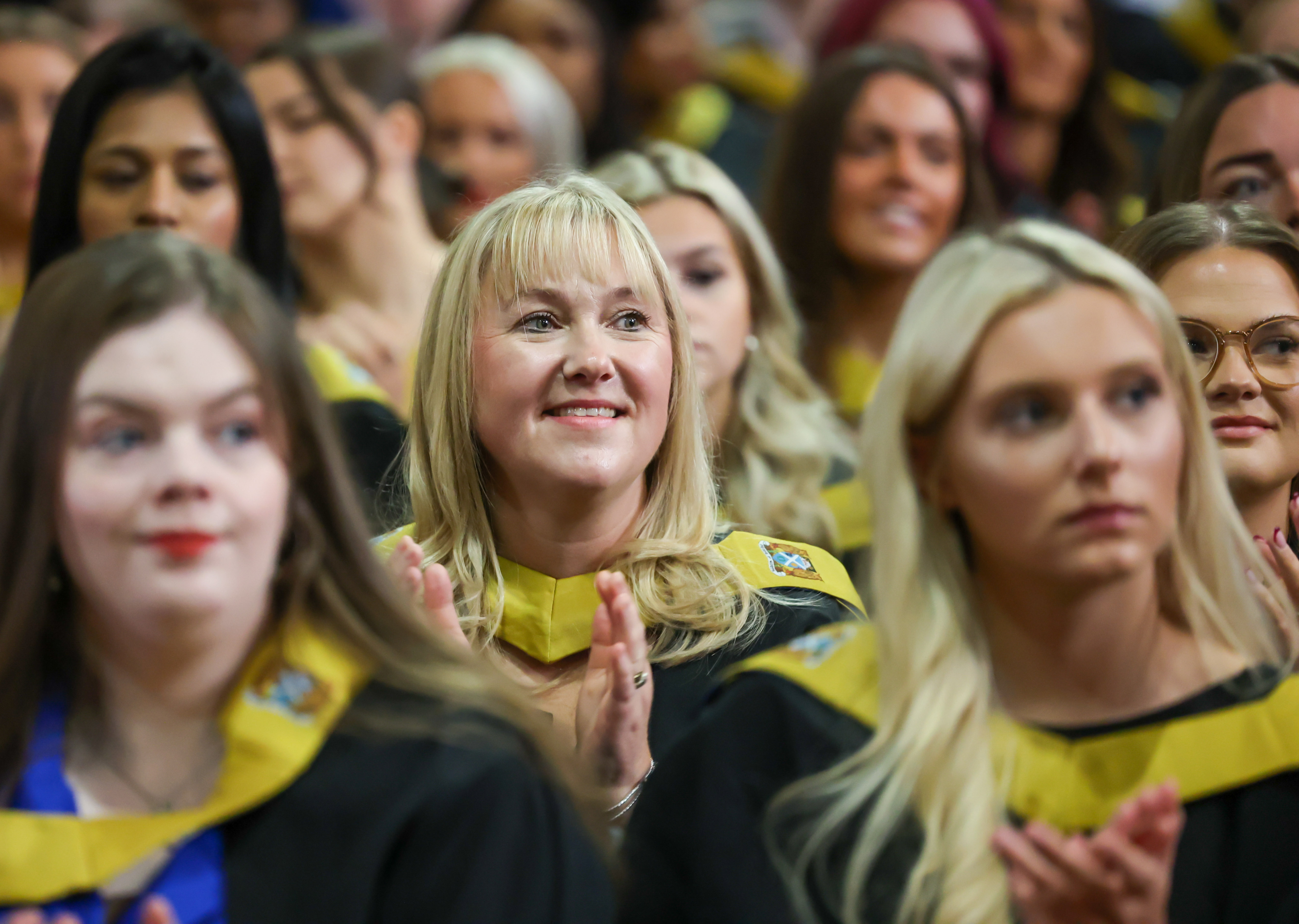 Graduation image showing smiling female students