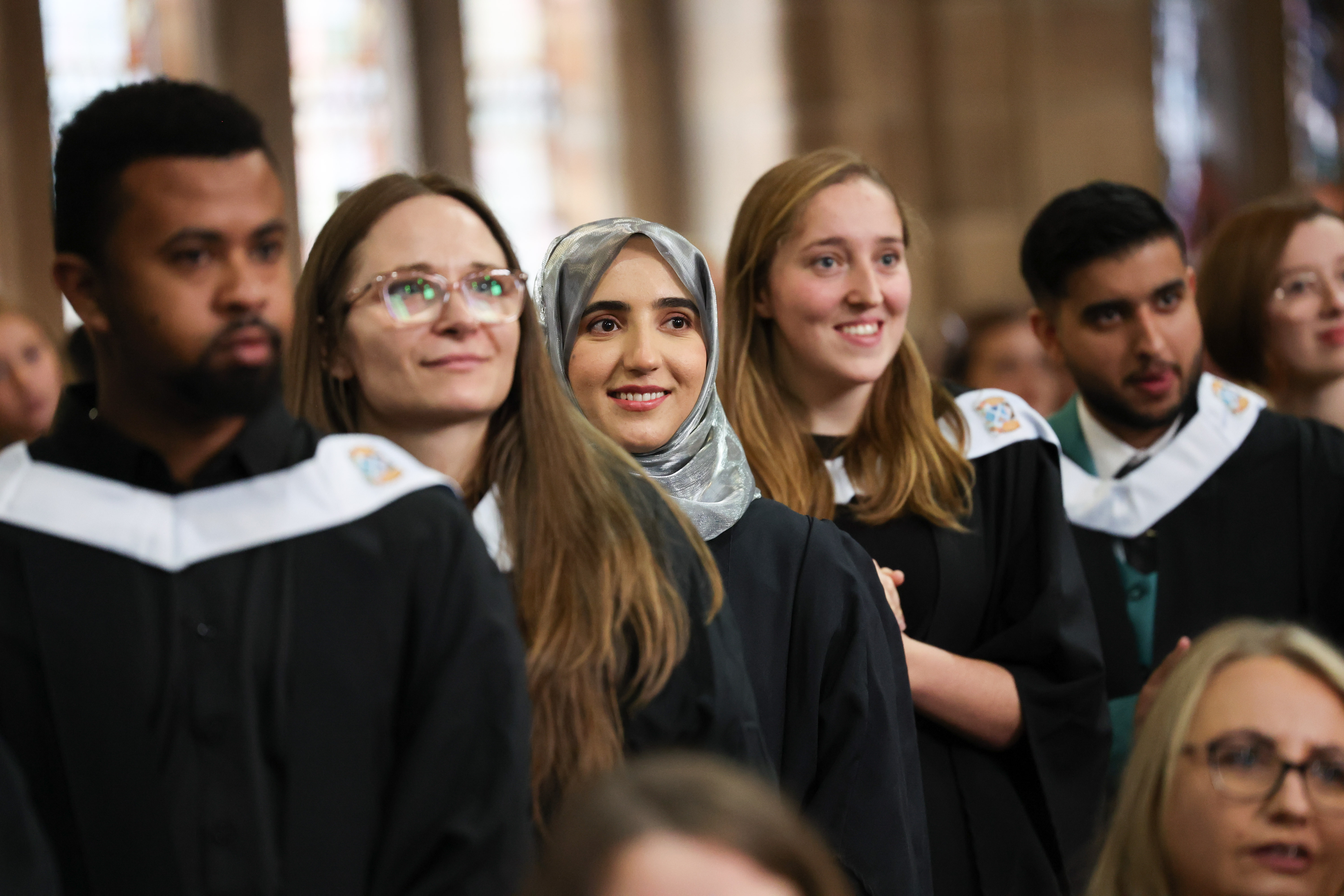 Graduation image showing mix of male and female students