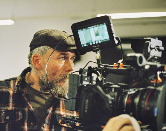 TV students using camera in the studio