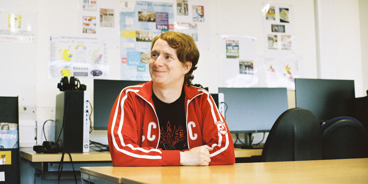 Student in a computer lab looking to the left