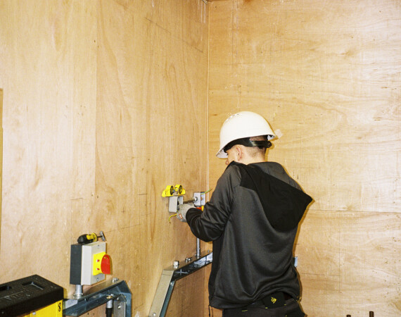 Male electrical student in workshop