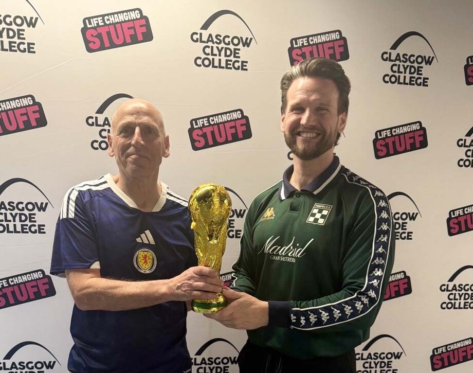 Image shows Hamish Husband and Craig Telfer with replica World Cup