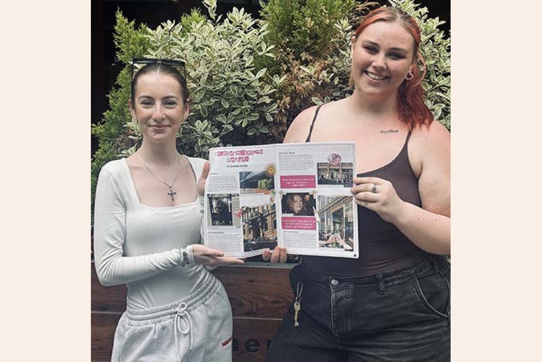 Journalism students with copy of aff campus gallery